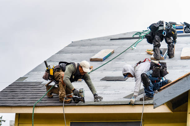 Professional Gutter Installation technician working in Hope, IN